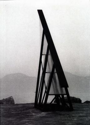 Exhibition Catalogues depicts: large triangular outdoor sculpture in dramatic landscape in black and white photo