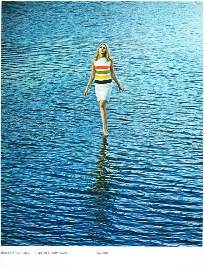 Advertisements depicts: woman in striped mini dress walking on water