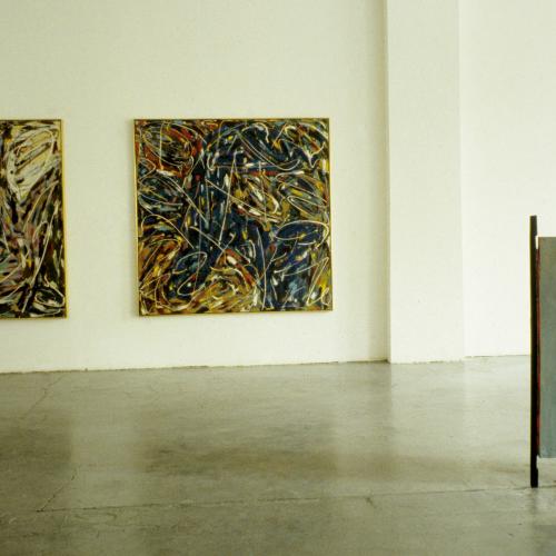 Photographic Materials depicts: color slide of artworks installed in a gallery