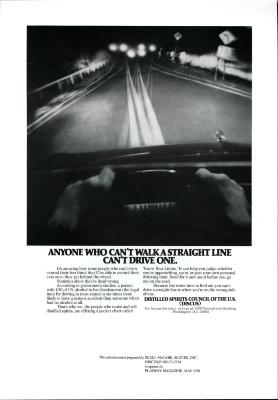 Advertisements depicts: Hands behind the wheel of a car, the lines of the road and lights off in the distance are all blurred 